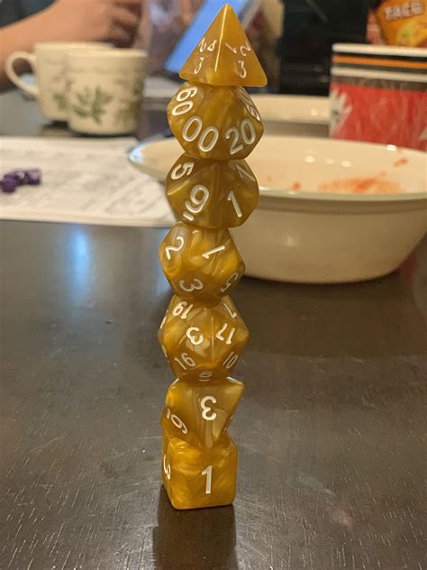 I’ve become quite skilled at stacking D&D dice : r/mildlyinteresting