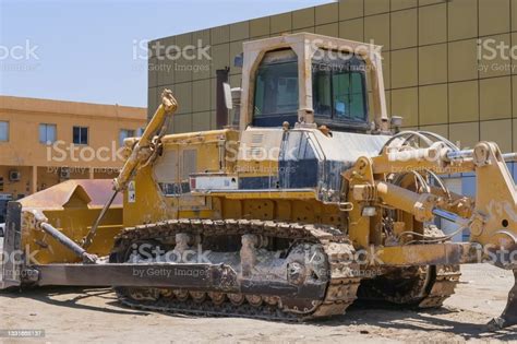 Old Dirty Extremely Heavy Bulldozer Arrived To Repair Station Yellow