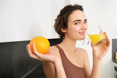 Premium Photo Image Of Sportswoman Fitness Girl Holding Glass Of