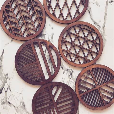 Laser Cut Laser Engraved Geometric Wooden Coasters In Oak