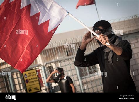 Bahrain 13th March 2015 Protesters Carrying The Flag Of Bahrain In