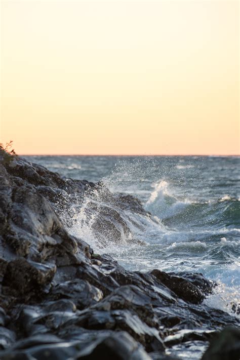 無料画像 ビーチ 海岸 砂 岩 海洋 地平線 日の出 日没 太陽光 朝 夜明け 崖 地形 水域 ケープ 風の