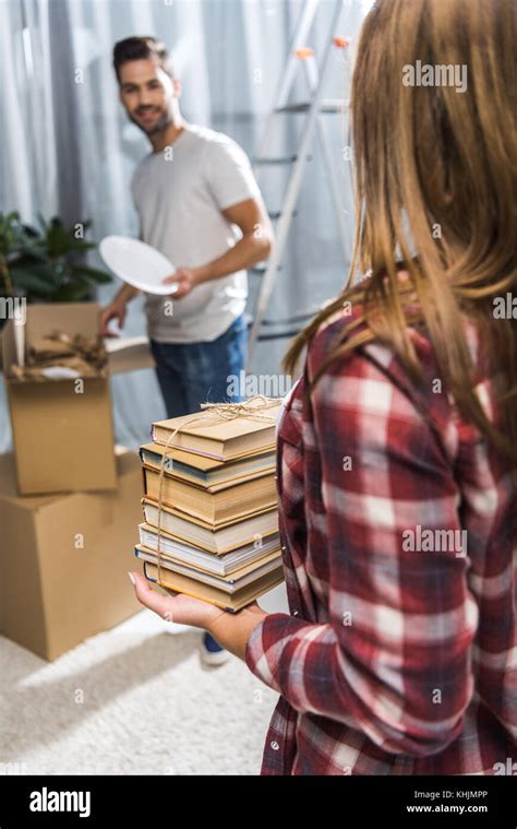 Couple Unpacking Moving Boxes Stock Photo Alamy