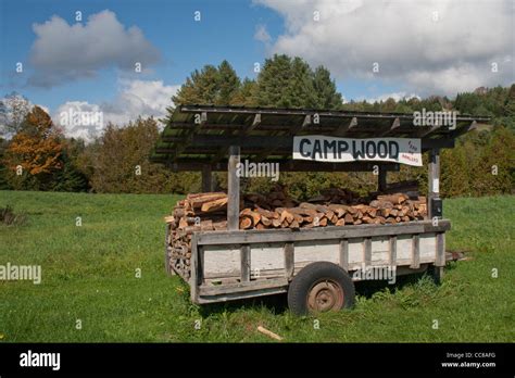 Firewood for sale in a trailer Stock Photo - Alamy