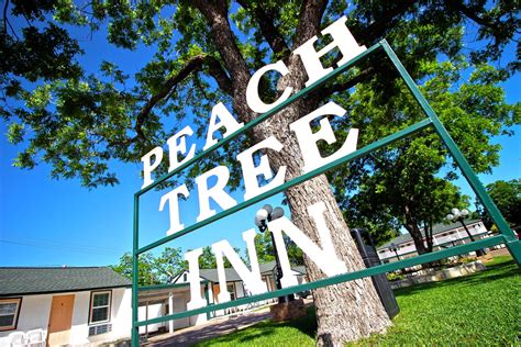 Photo Gallery for The Peach Tree Inn & Suites - Voted #1 Motel in Fredericksburg, Texas