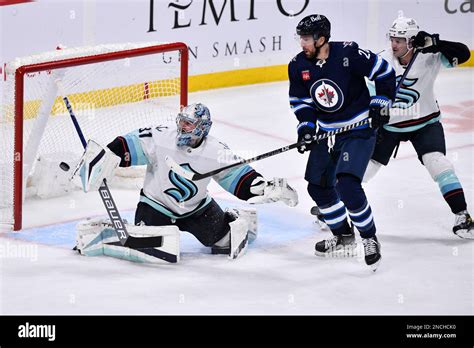 Seattle Kraken S Goaltender Philipp Grubauer 31 Makes A Save On A