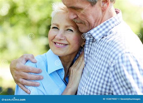 Caring Senior Couple Embracing In Park Stock Image Image Of Happy Leisure 153879007