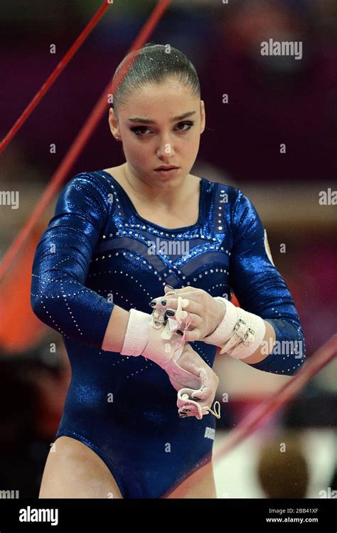 Russia's Aliya Mustafina competes on the uneven bars during the ...