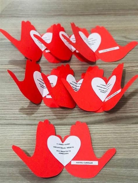 Some Red Paper With White Hearts On Them And One Is Cut Out To Look