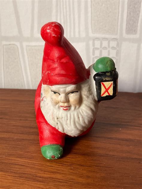 Se produkter som liknar Tomte med lykta porslin Retro på Tradera