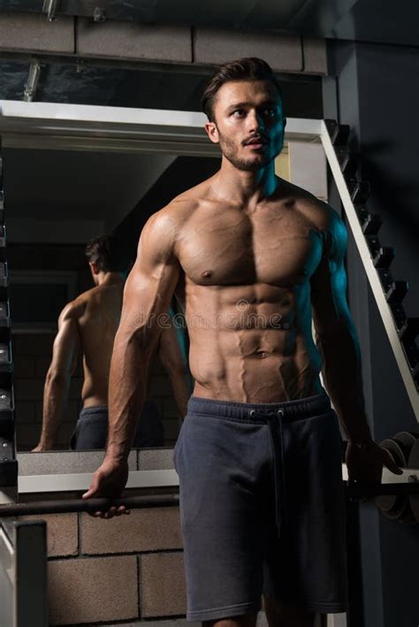 Attractive Young Man Resting In Gym Afther Exercise Stock Photo Image