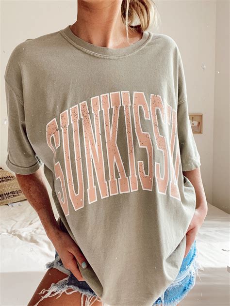 Retro” Sunkissed Design On Back Tee Trendy Tshirts Shirts Graphic