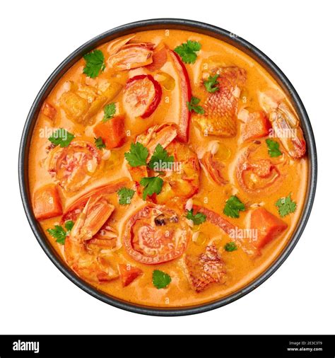 Moqueca With Fish And Shrimps In Black Bowl Isolated On White