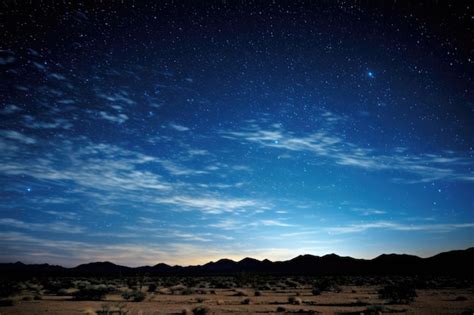 Premium Photo | A breathtaking view of a dark desert night sky with ...