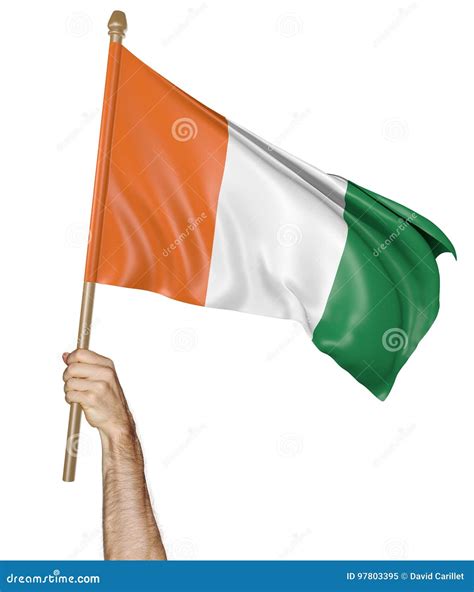 Hand Proudly Waving The National Flag Of Ivory Coast Stock Image