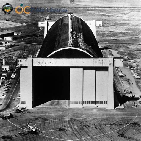 Aerial view of the Tustin MCAS blimp hangar and Tustin area, ca. 1960 ...