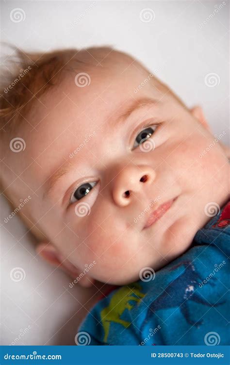 Cute Ginger Haired Baby Lying Down Stock Image - Image: 28500743