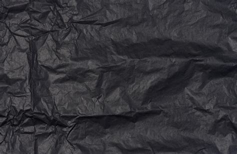 Premium Photo Crumpled Sheet Of Black Parchment Paper Abstract Background