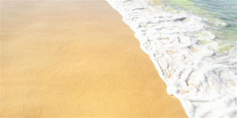 Premium Photo Blue Sea Wave White Foam Golden Sand Of Sea Coast