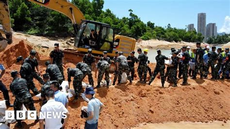 China Tunnel Flood Desperate Search To Find Trapped Workers Bbc News