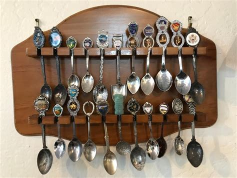 Lot of 22 Collector Spoons with Display Rack [2015] | EstateSales.org