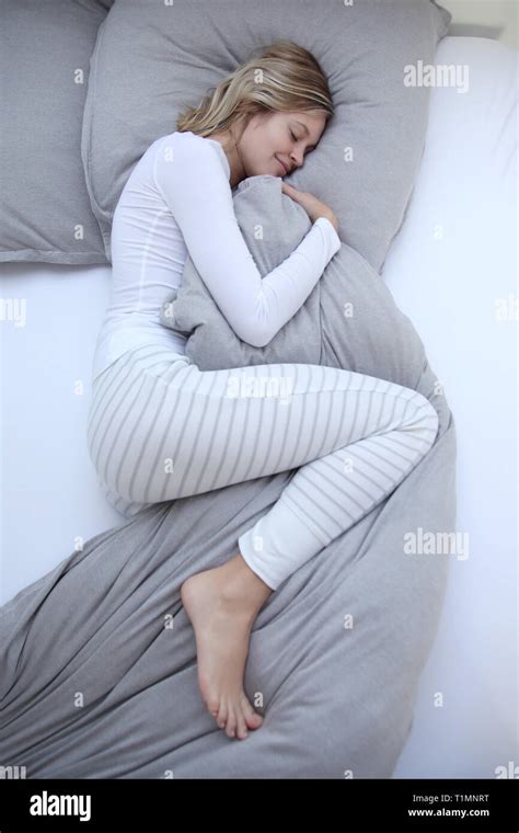 Pretty Blond Woman Sleeps In Her Bed Stock Photo Alamy