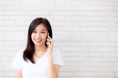 Beautiful Of Portrait Young Asian Woman Talk Smart Phone And Smile