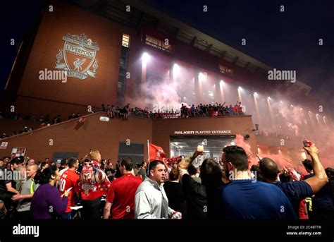 Liverpool fans celebrate outside Anfield, Liverpool Stock Photo - Alamy