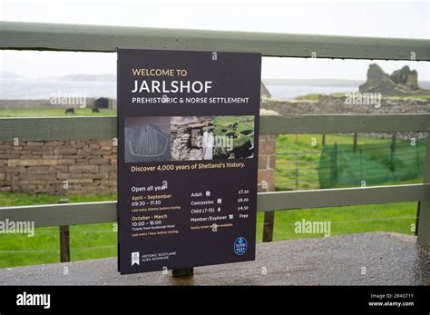 Sign for tourist site of Jarlshof on Shetland, blurred background of ...