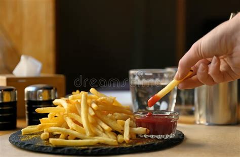 Dipping French Fry In Ketchup Stock Image Image Of Delicious Person