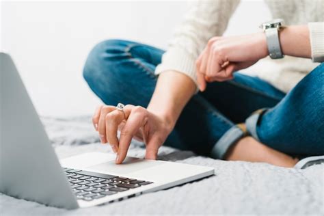 Free Photo | Smiling woman with coffee using laptop