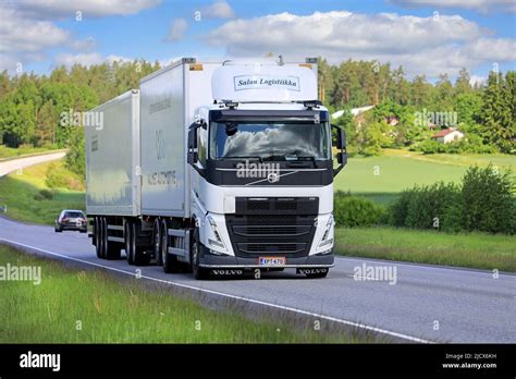 New White Volvo FH Truck Salon Logistiikka Ky Pulls Trailer Along