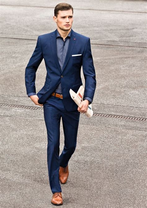 Crisp Slim Navy Suit With Brown Cap Toe Shoes Brown Leather Belt Light Blue Shirt White Cotton