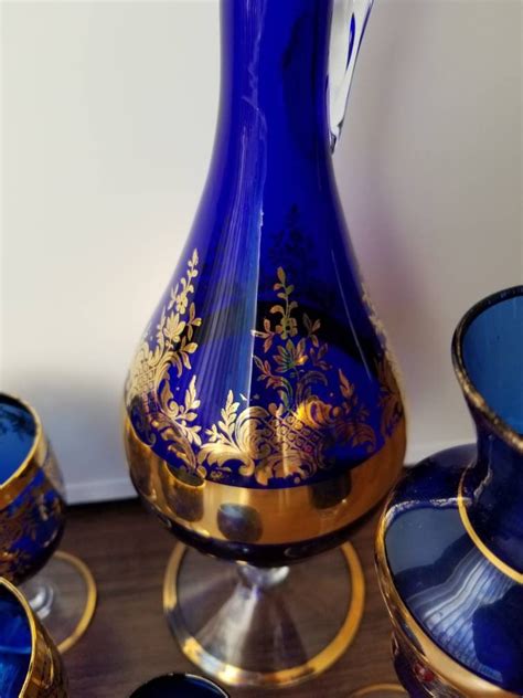 Vintage Bohemian Czech Cobalt Blue And Gold Pitcher Decanter With 6 Wine Glasses Sherry Glass