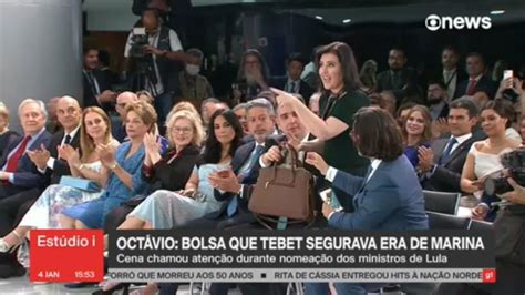 Simone Tebet segura bolsa de Marina Silva durante nomeação de ministros