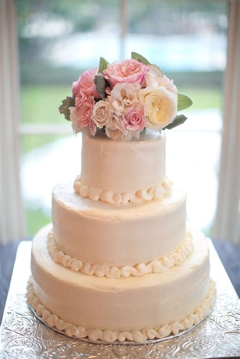 Three Tier White Wedding Cake With Roses