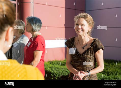 Mrs. Julie Luckey greets Mrs. Hollyanne Milley and members of her staff ...