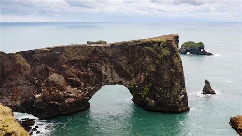 Premium Photo View Stone Arch On Dyrholaey Peninsula In Iceland