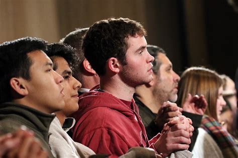 People Praying In Catholic Church