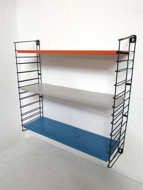 A Dekker Tomado Shelving Unit Wall Unit Catawiki