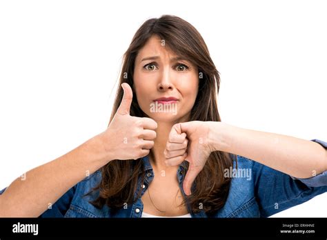 Beautiful Woman Confused Making Thumbs Up And Down Stock Photo Alamy