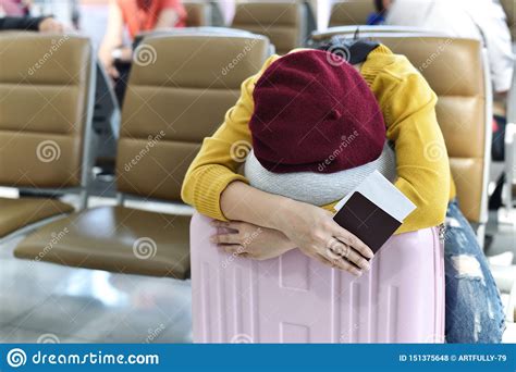 Traveler Sleeping At The Waiting Area Lounge Airport Terminal Stock