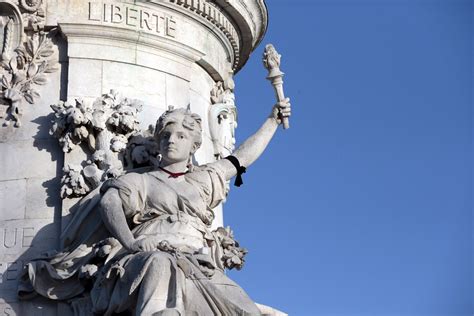 Paris terror attacks: Place de la Republique statue's silent, touching ...