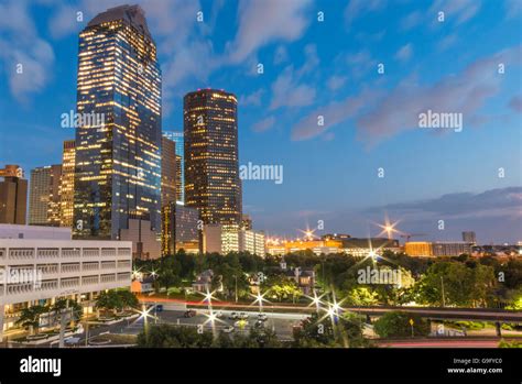 Downtown Houston skyline at night Stock Photo - Alamy