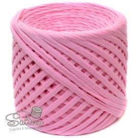 The Pink Yarn Is Spooled On Top Of Each Other