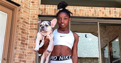 Simone Biles Flaunts Abs and Navel Piercing and Poses with Her Dogs in ...