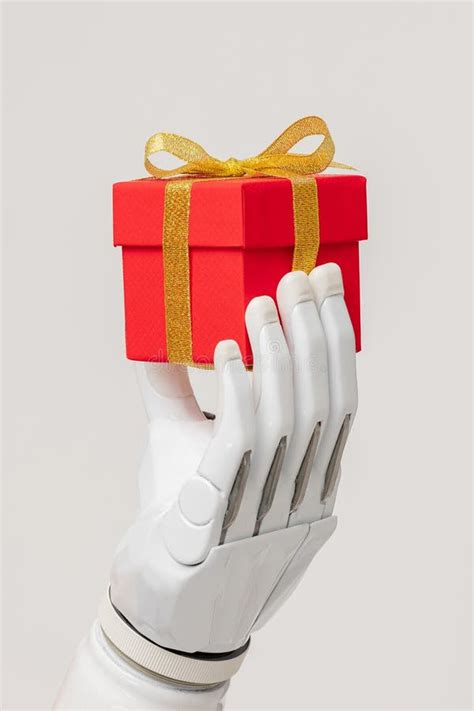 A Bionic Prosthetic Arm or Forearm in White on a Beige Background Holds ...