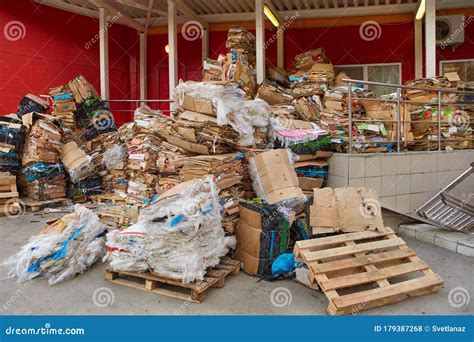 A Large Pile Of Cardboard Boxes From The Goods Sold Stored In The Back