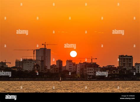 Sunset on West lake, Ho tay, Hanoi, Vietnam Stock Photo - Alamy