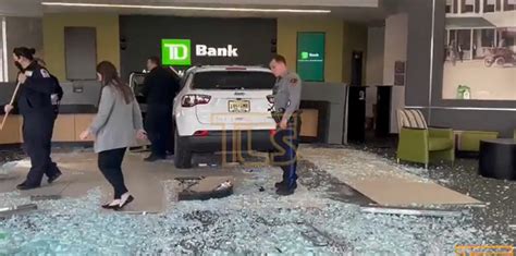 A car has plowed through the front doors of a TD Bank in Toms River ...